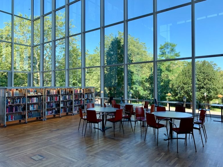 three round white wooden tables