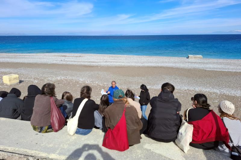 Students from USWPS and UAEGEAN learn about the history of Rhodos Greece at the seaside