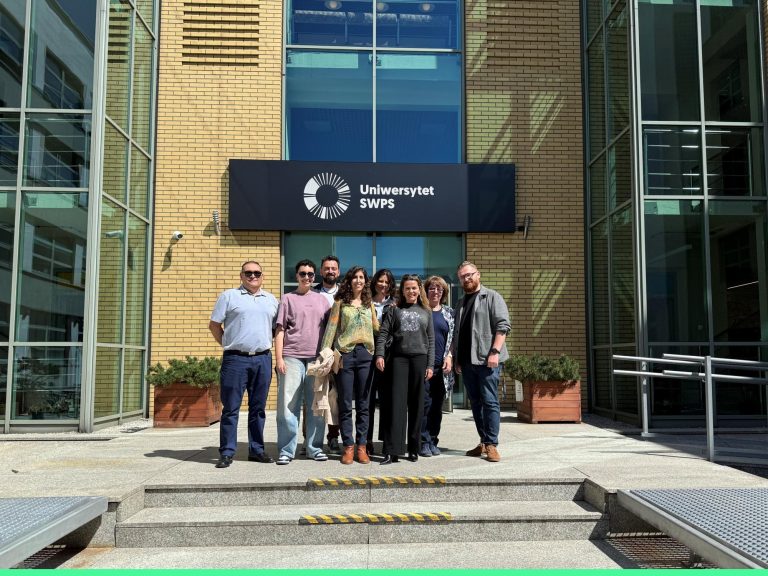 Members of the ERUA AI-CARE project team on the campus of SWPS University in Warsaw