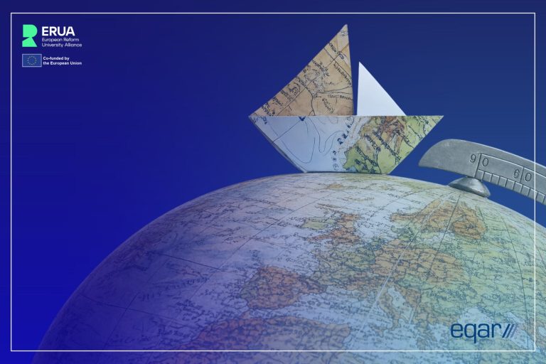 Small sailboat made of maps sailing the circumference of a globe